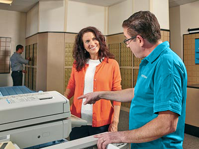 Associate showing customer printer options